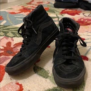 Black hi-top sneakers